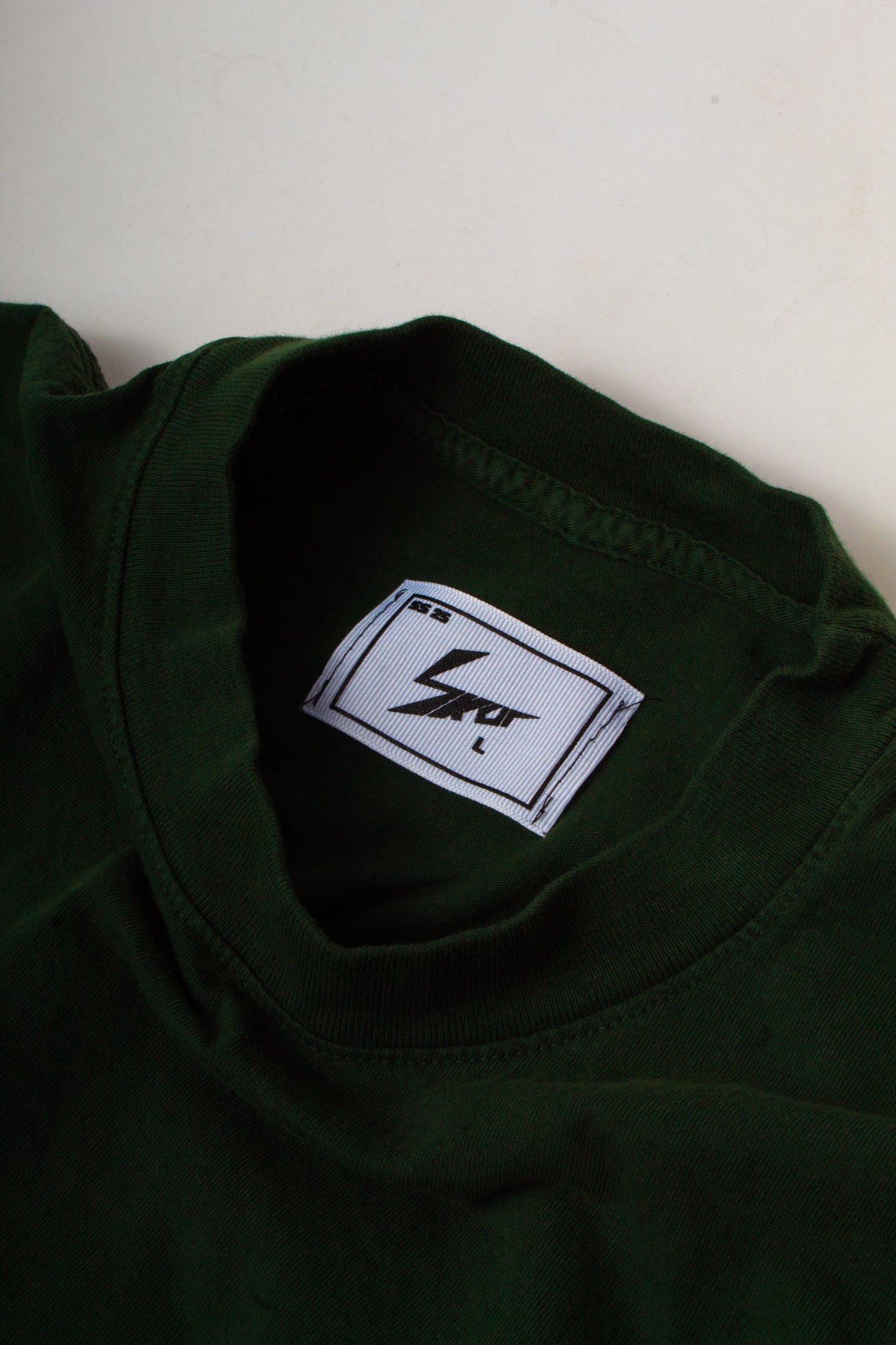 GREEN MARIONETTE TEE