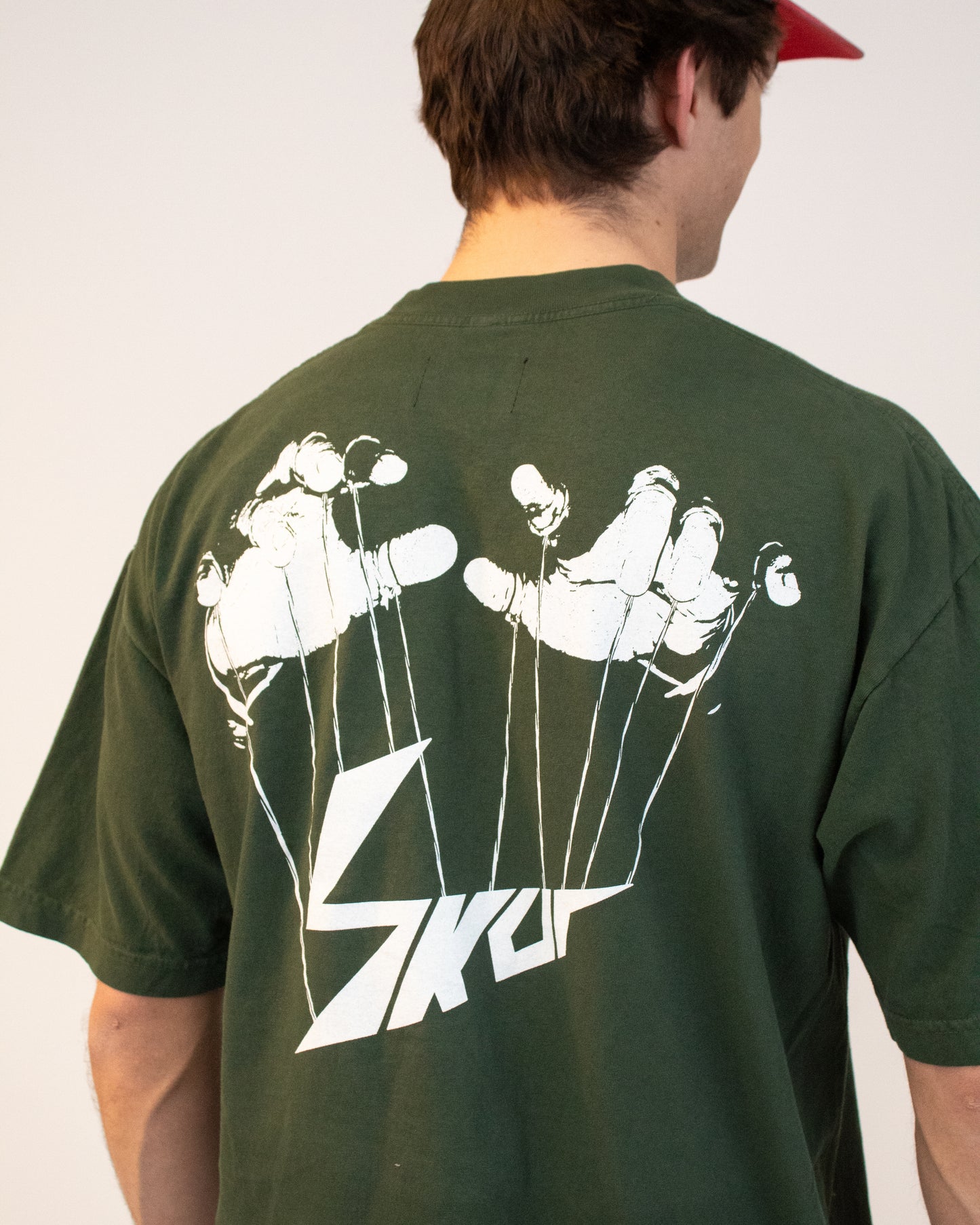 GREEN MARIONETTE TEE